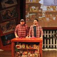 Two men standing behind a table