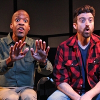 Two men looking forward with looks of mild alarm on their faces.