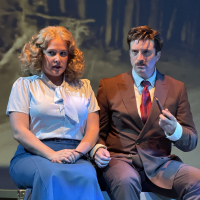 A man and woman sitting togehter and looking unhappy