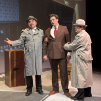 Two men in trenchcoats holding onto another aggressively