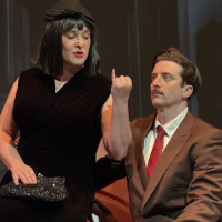 A woman showing her little finger to a man in a suggestive way