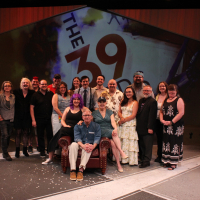 A group of people in front of a projection of The 39 Steps